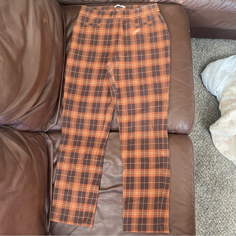Orange and brown plaid trousers